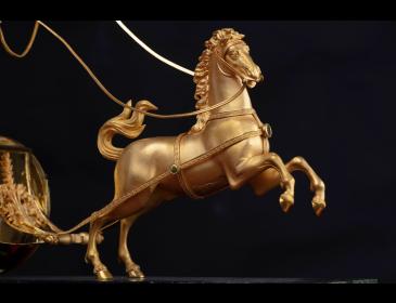 Orologio raffigurante carro e Amore